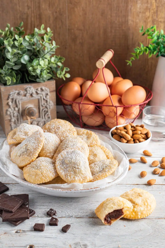 dolci abruzzesi di natale tradizionali
ricette dolci natalizi abruzzesi facili
caggionetti ripieno tradizionale abruzzese
storia del parrozzo abruzzese
dolci abruzzesi per le feste
dolci di natale dell’Abruzzo antico
dolci natalizi abruzzesi da fare con i bambini